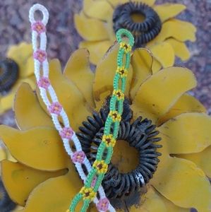 Pair of daisy chain friendship bracelets